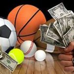 variety of sports balls and dollars